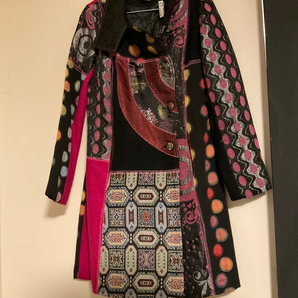 It’s a techno colored dream coat…size  medium